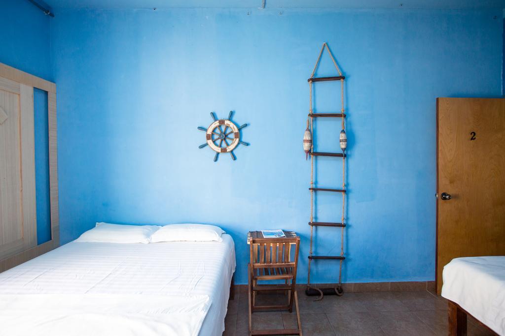 G.T. Guest House Garapan Oda fotoğraf