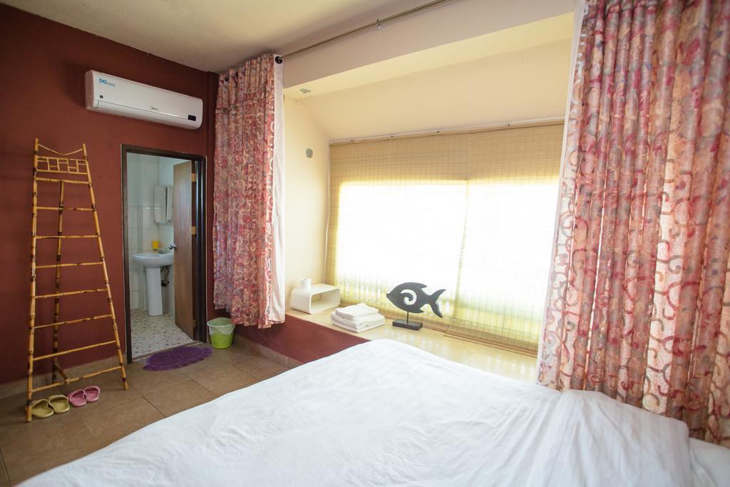 G.T. Guest House Garapan Oda fotoğraf
