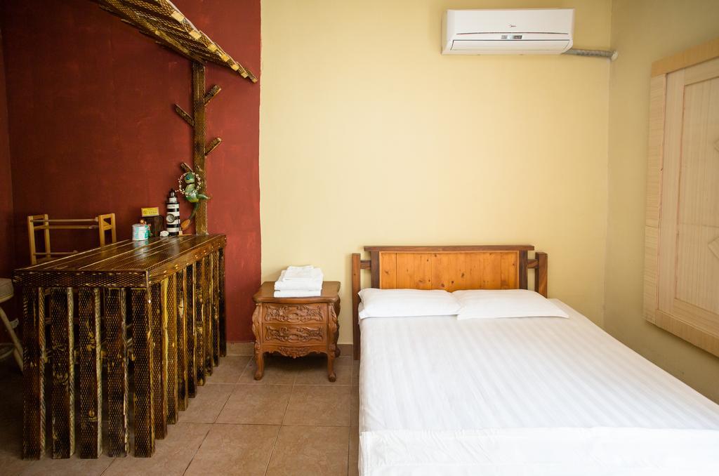 G.T. Guest House Garapan Oda fotoğraf