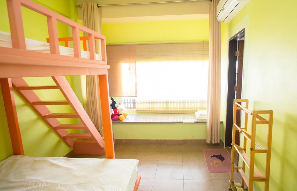 G.T. Guest House Garapan Oda fotoğraf