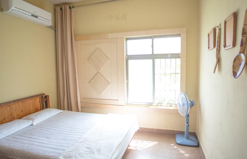 G.T. Guest House Garapan Oda fotoğraf