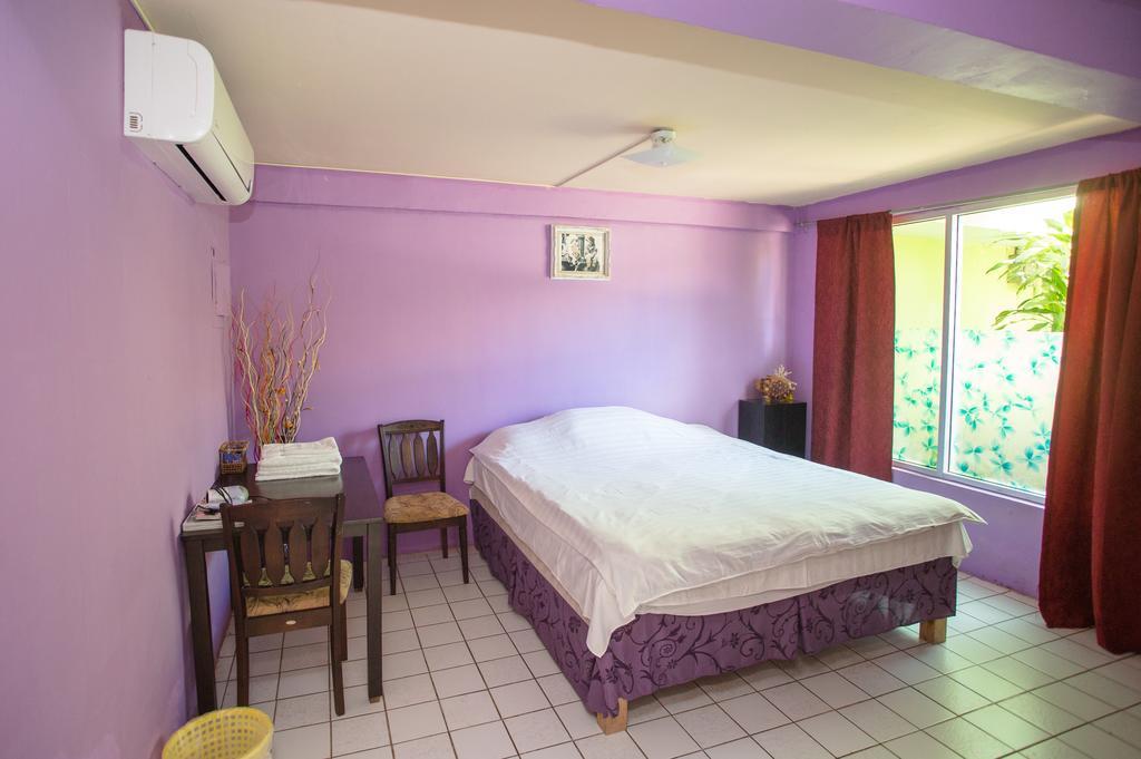 G.T. Guest House Garapan Oda fotoğraf